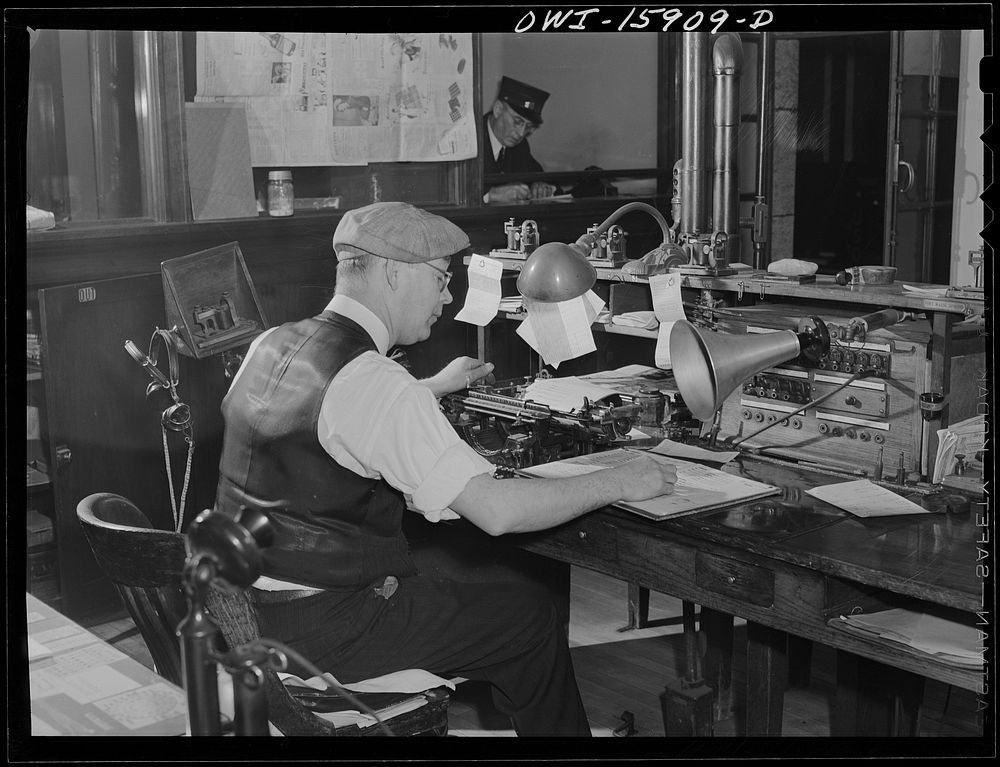 Chicago, Illinois. The telegrapher and dispatcher's office at Union Station. It is here that conductors get their train…