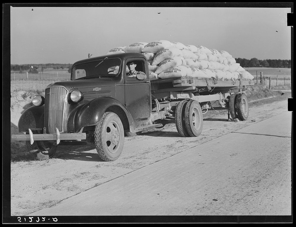 Truckload with fertilizer along highway. Greene County, Georgia. Sourced from the Library of Congress.