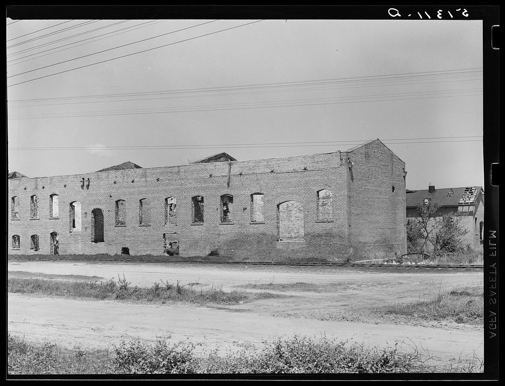 Old cotton warehouse with roof taken off to avoid taxes. Rutledge, Georgia. Sourced from the Library of Congress.