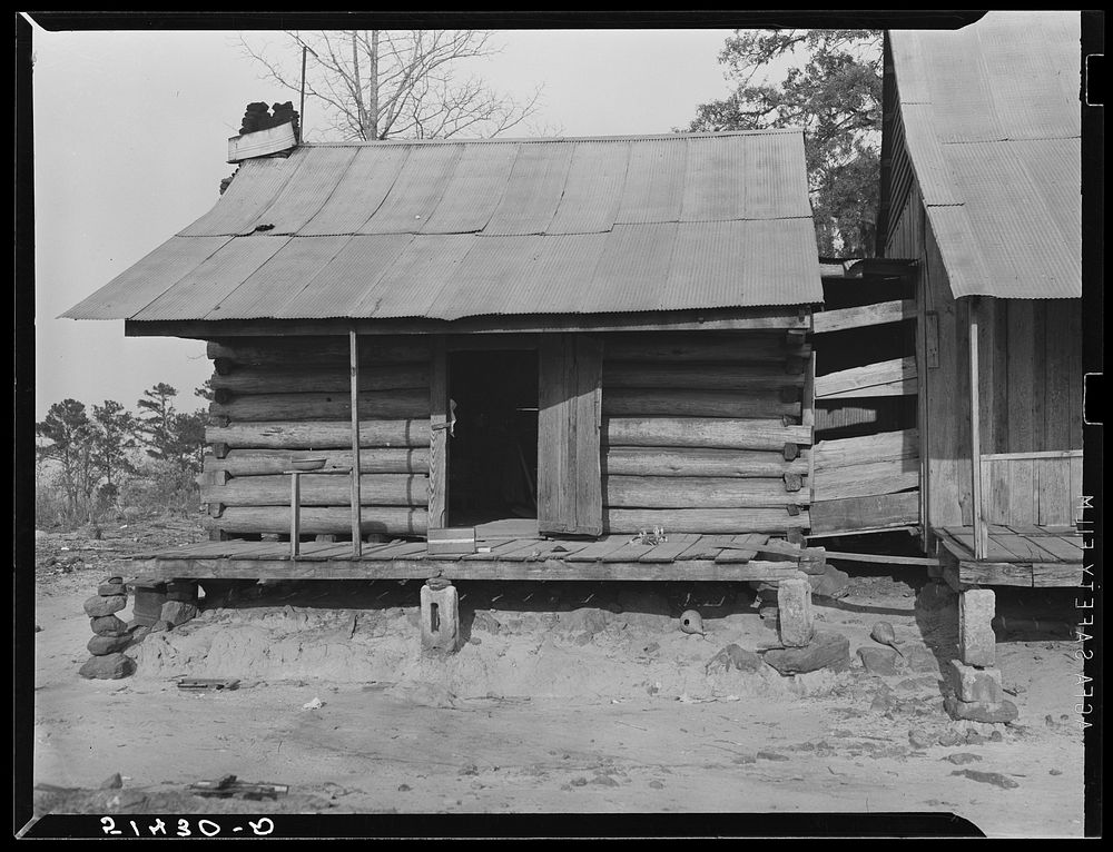 Section of two-room home of J.D. Smith, RR (Rural Rehabilitation) family (see 51402-D). Sourced from the Library of Congress.