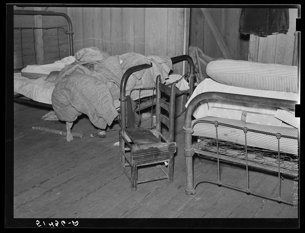 Bedroom (and kitchen and living room) of former RR  (Rural Rehabilitation) family (see 51435-D). Coffee County, Alabama.…