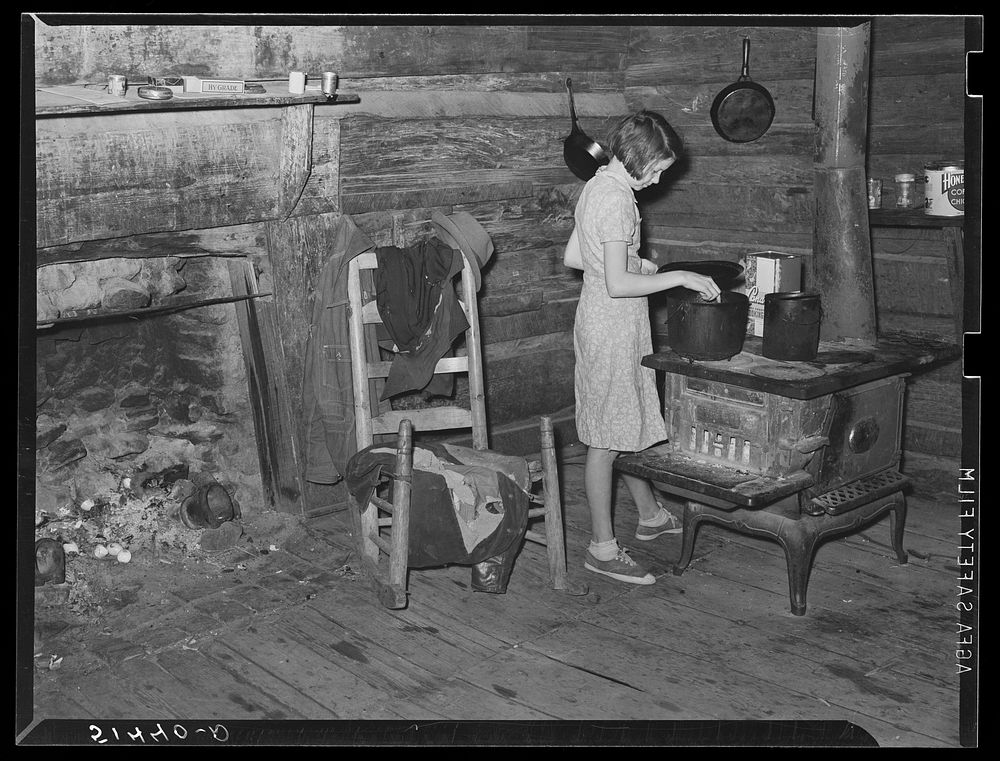 Gladys Smith, thirteen year old girl, who cooks and cares for a family of six. RR  (Rural Rehabilitation) first year (see…