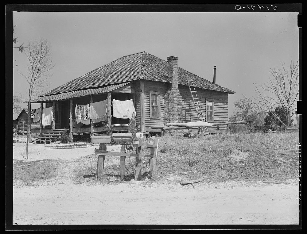Home of Peacock family, RR  (Rural Rehabilitation), four 4 years. Coffee County, Alabama. Sourced from the Library of…