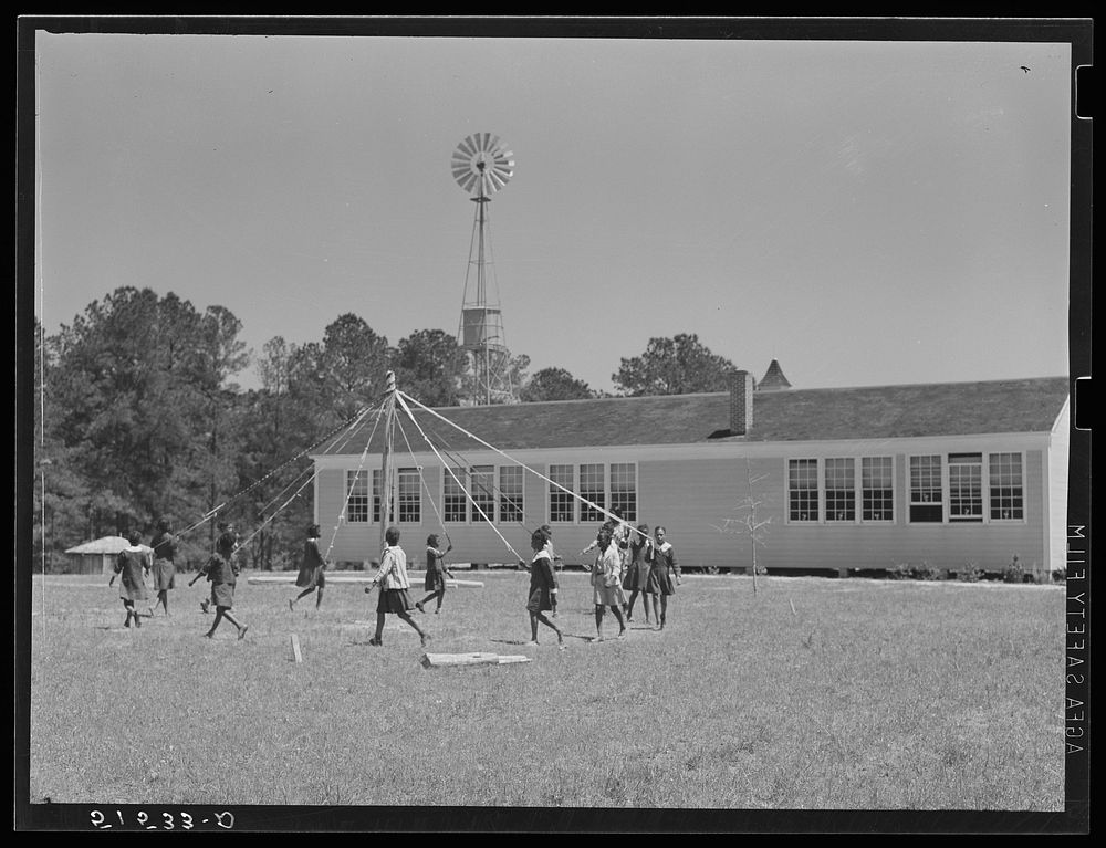 [Untitled photo, possibly related to: Outdoor games and recreation led by Florence Wright (in white slacks), recreation…