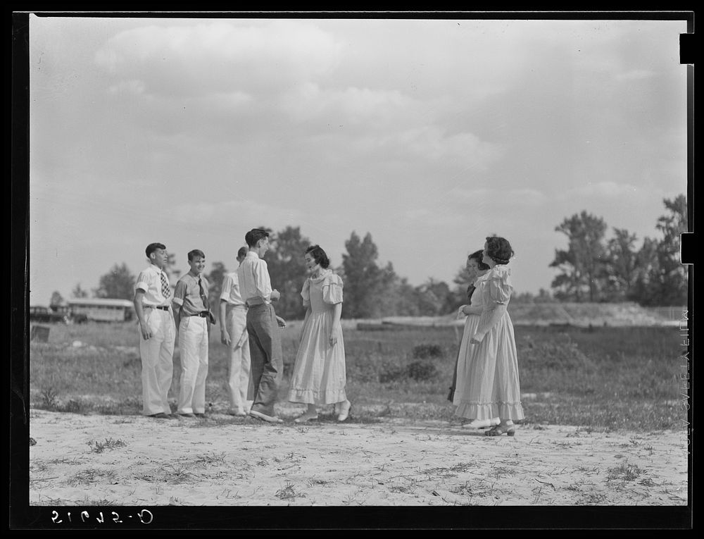 Ninth grade dancing Virginia reel at May Day-Health Day festivities. Ashwood Plantations, South Carolina. Sourced from the…