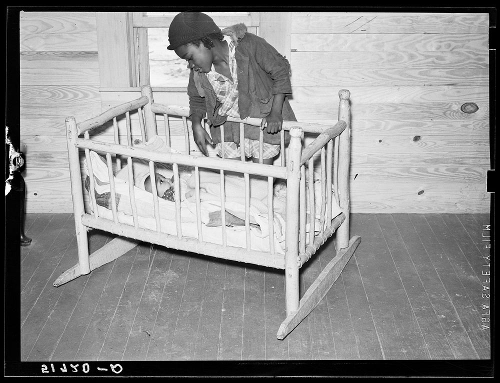 Cradle made by Charlie McGuire (tenant purchase borrower) and two of his children. Pike County, Alabama. Sourced from the…