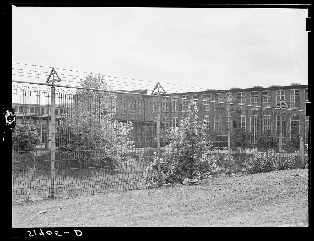 "Tornado" fence at cotton mill. Atlanta, Georgia. Sourced from the Library of Congress.