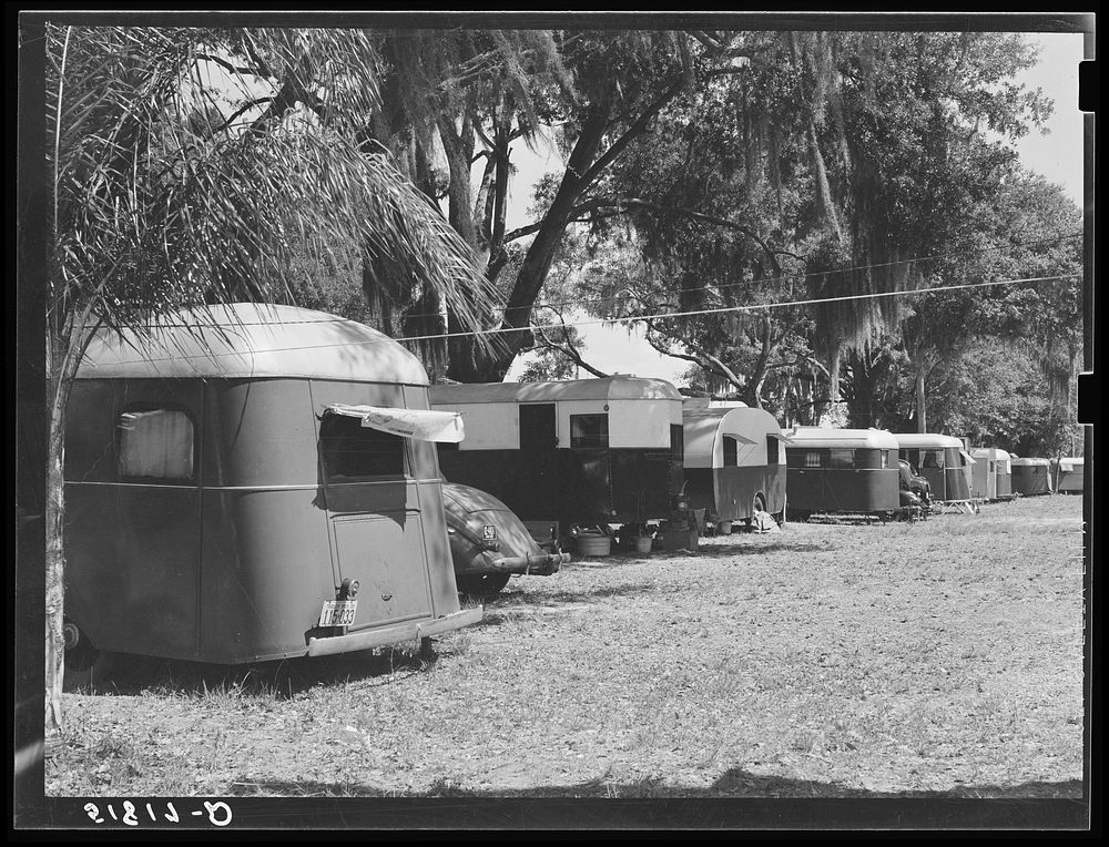 Tourist camp, showing many modern trailers crowded together, some of the families remaining for weeks and months. Dade City…