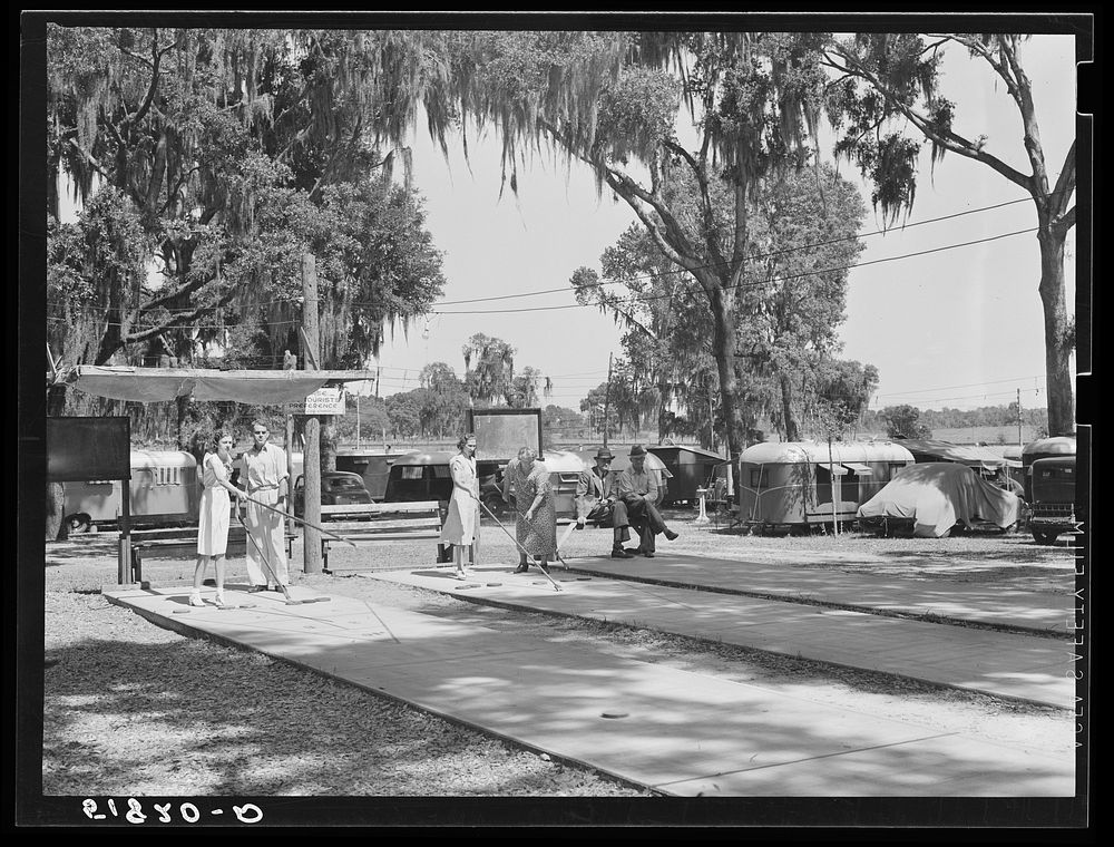 Tourist in trailer camp playing shuffleboard. Dade City, Florida. Sourced from the Library of Congress.