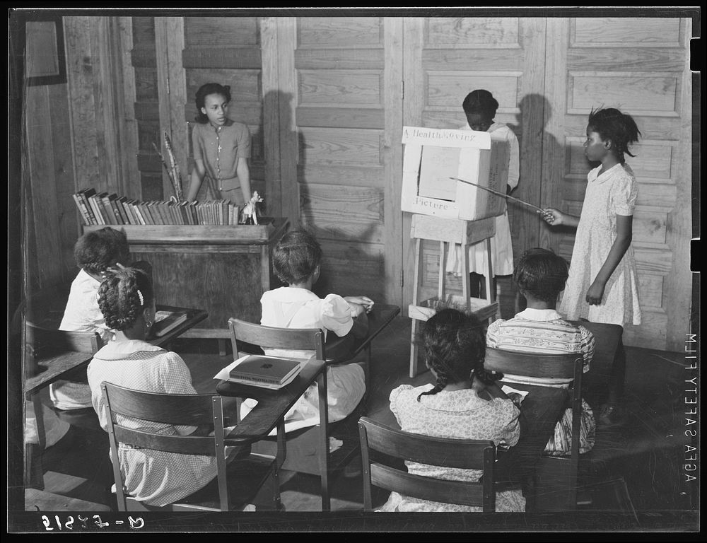 Fourth and fifth grades in Flint River School, Georgia, demonstrating a health moving picture which they made. Sourced from…