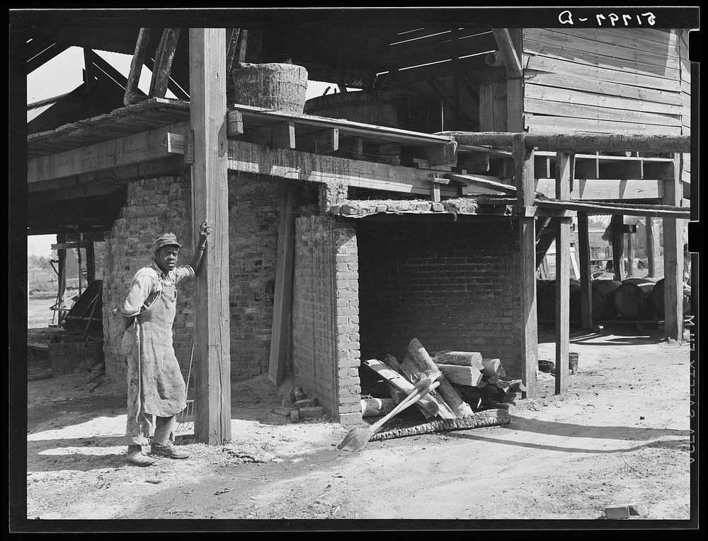  worker who had been cleaning hearth in turpentine kiln, Iron City, Alabama. Sourced from the Library of Congress.