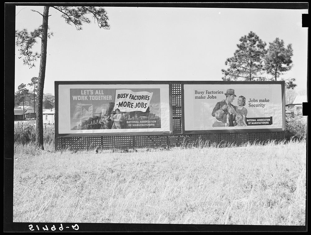 Highway signs by lumber planing mill. Cairo, Georgia. Sourced from the Library of Congress.