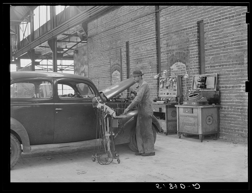 Testing motor of car in FSA (Farm Security Administration) warehouse depot. Atlanta, Georgia. Sourced from the Library of…