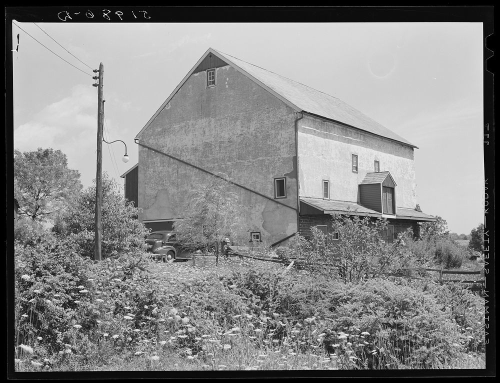 [Untitled photo, possibly related to: Barn on rich farmland. Bucks County, Pennsylvania]. Sourced from the Library of…