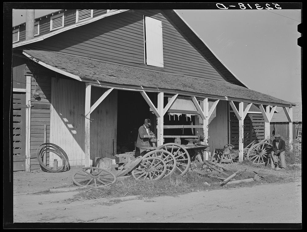 Uncle George's smith and carpentry shop. He has been on the plantation for fifty years. Marcella Plantation, Mileston…