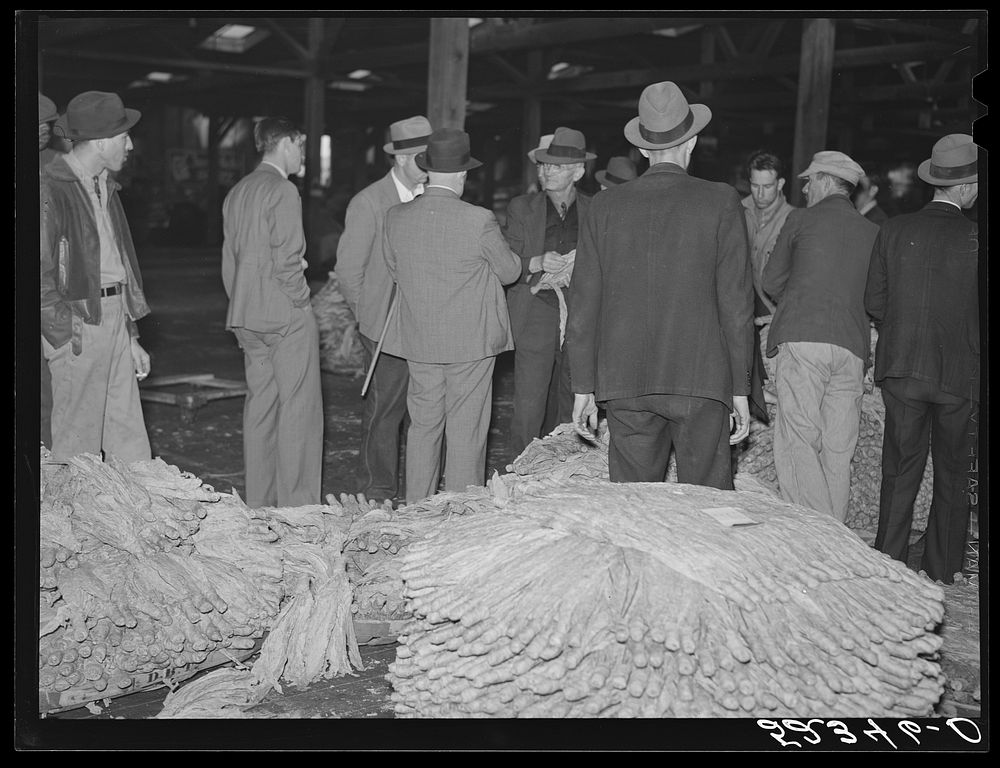 [Untitled photo, possibly related to: Auction sale in tobacco warehouse. Durham, North Carolina]. Sourced from the Library…