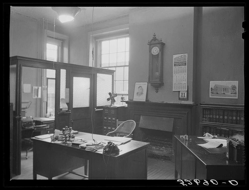 Clerk of court's office. Note the picture "Roosevelt a gallant leader" and of the proposed (now completed) building of the…