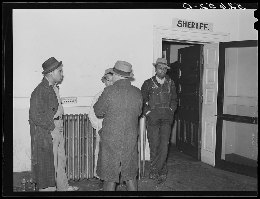 es waiting outside sheriff's office in county courthouse. Oxford, Granville County, North Carolina. Sourced from the Library…