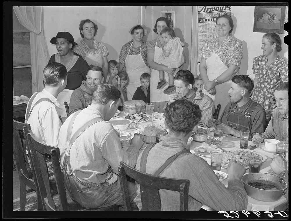 Some of the Wilkins clan at dinner on corn-shucking day at home of Mrs. Fred Wilkins. Tallyho, near Stem, Granville County…