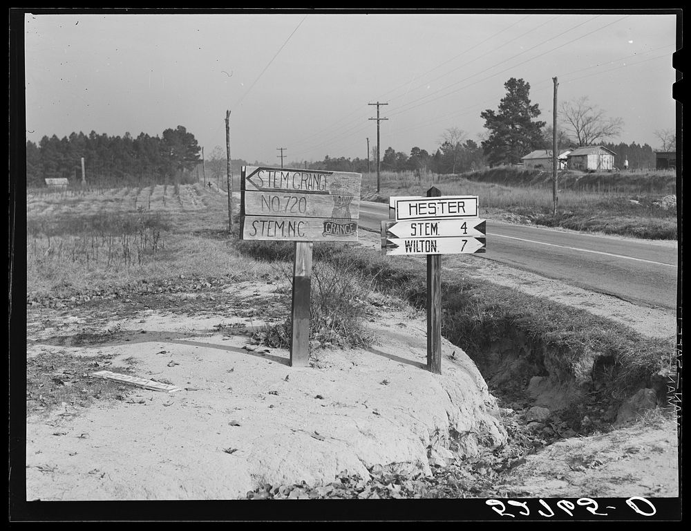 Hand-painted sign pointing to Stem Grange, west side of Highway No. 15 at Hester, Granville County, North Carolina. See…
