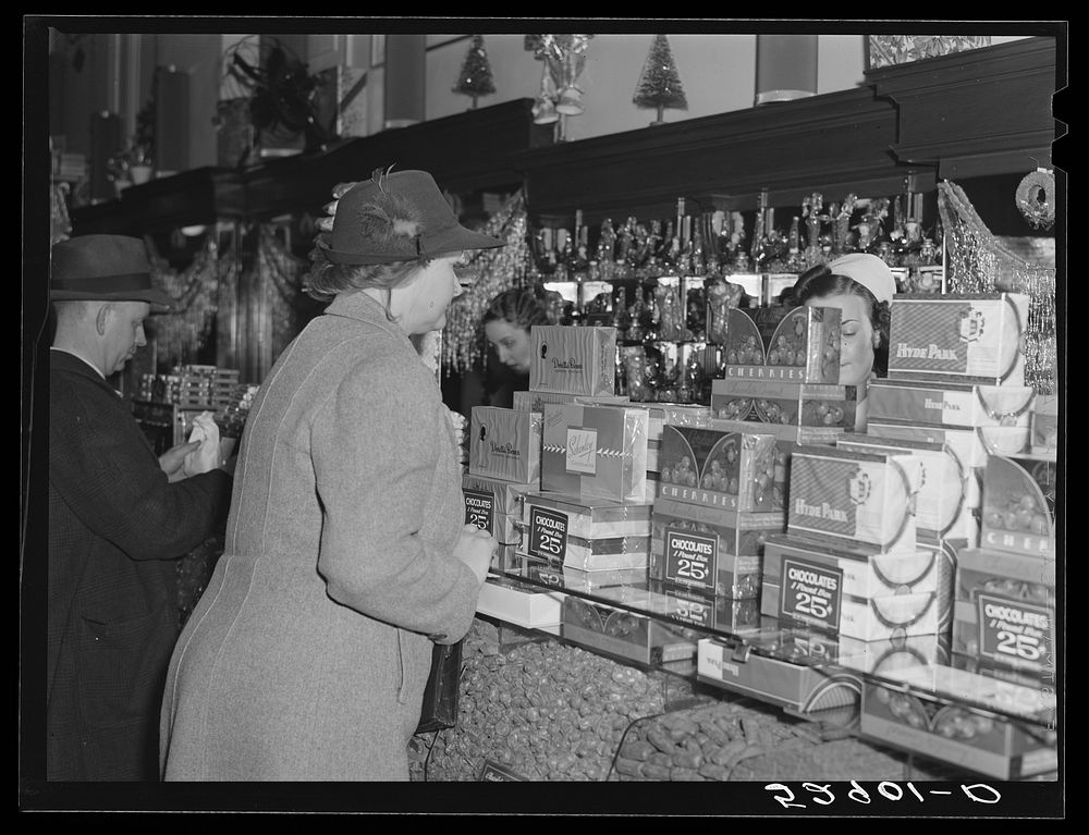 Mrs. Elvin Wilkins (Rosa) buying candy to send away to her daughter at school. She came to Durham with her husband this day…