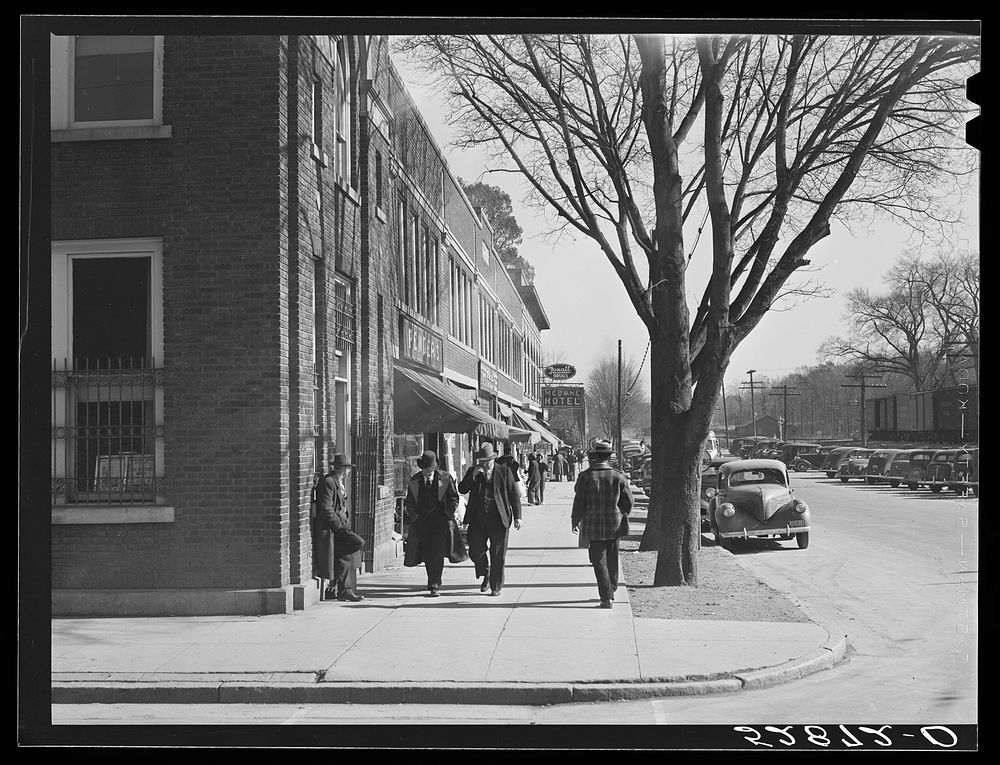 Main street on day of tobacco auctions in Mebane, North Carolina.  This is a small town about [...] with [...] tobacco…