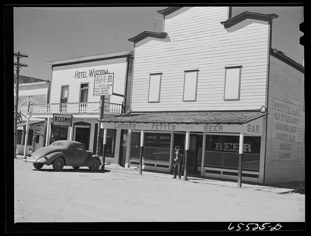 [Untitled photo, possibly related to: Big Hole Valley, Beaverhead County, Montana. Buildings on the main street of Wisdom…