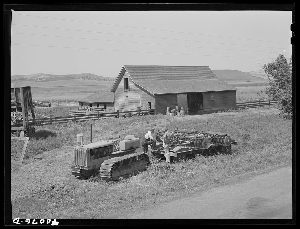 [Untitled photo, possibly related to: Tractor and harrow. Latah County, Idaho] by Russell Lee