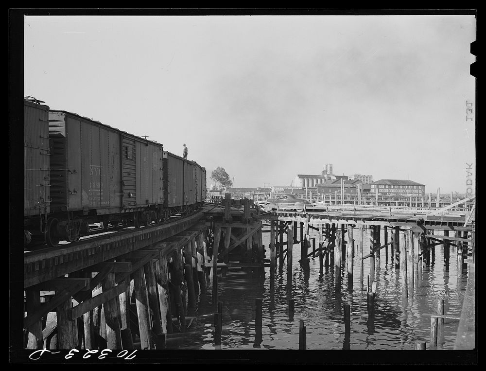 On the harbor of Astoria, Oregon. Shipping by rail and water is centered on fish, vitamin products, lumber and grain by…