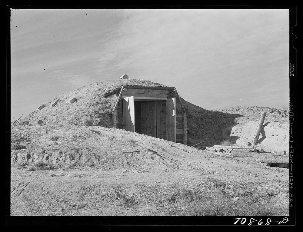 Cellar used for potatoes, canned goods, etc. on Black Canyon Project farm. Canyon County, Idaho by Russell Lee