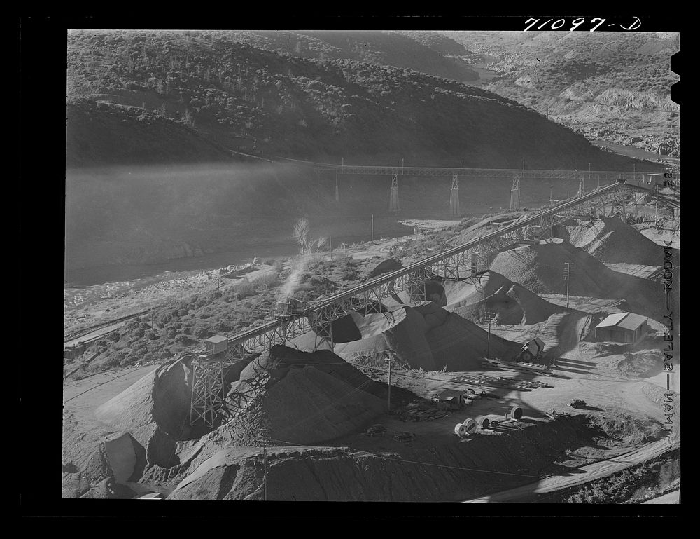 [Untitled photo, possibly related to: Gravel at end of belt conveyor. Shasta Dam, Shasta County, California] by Russell Lee