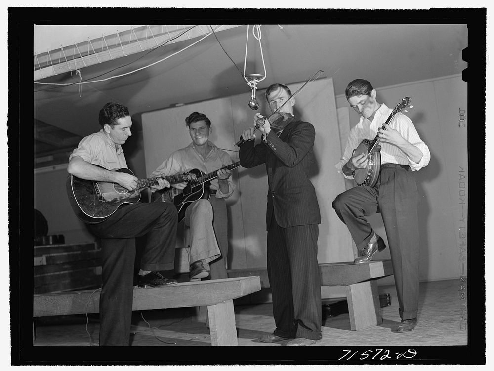 Woodville, California. FSA (Farm Security Administration) farm workers' community. Musicians at the Saturday night dance by…