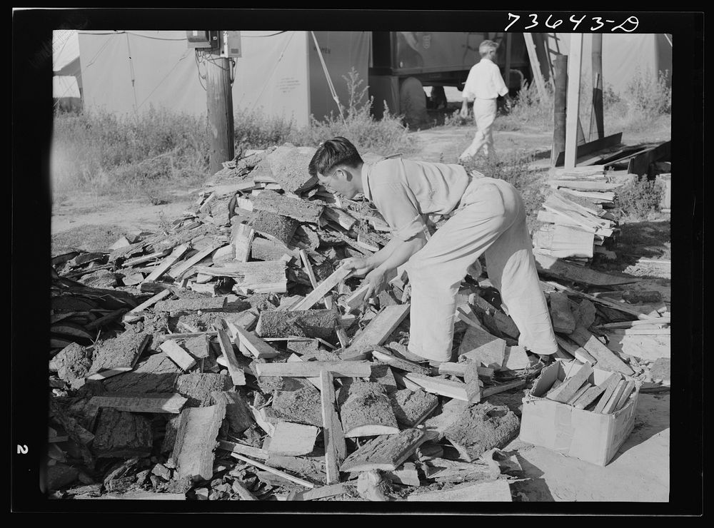 Nyssa Oregon. FSA (Farm Security Administration) mobile camp. Woodpile at the camp for Japanese-Americans by Russell Lee