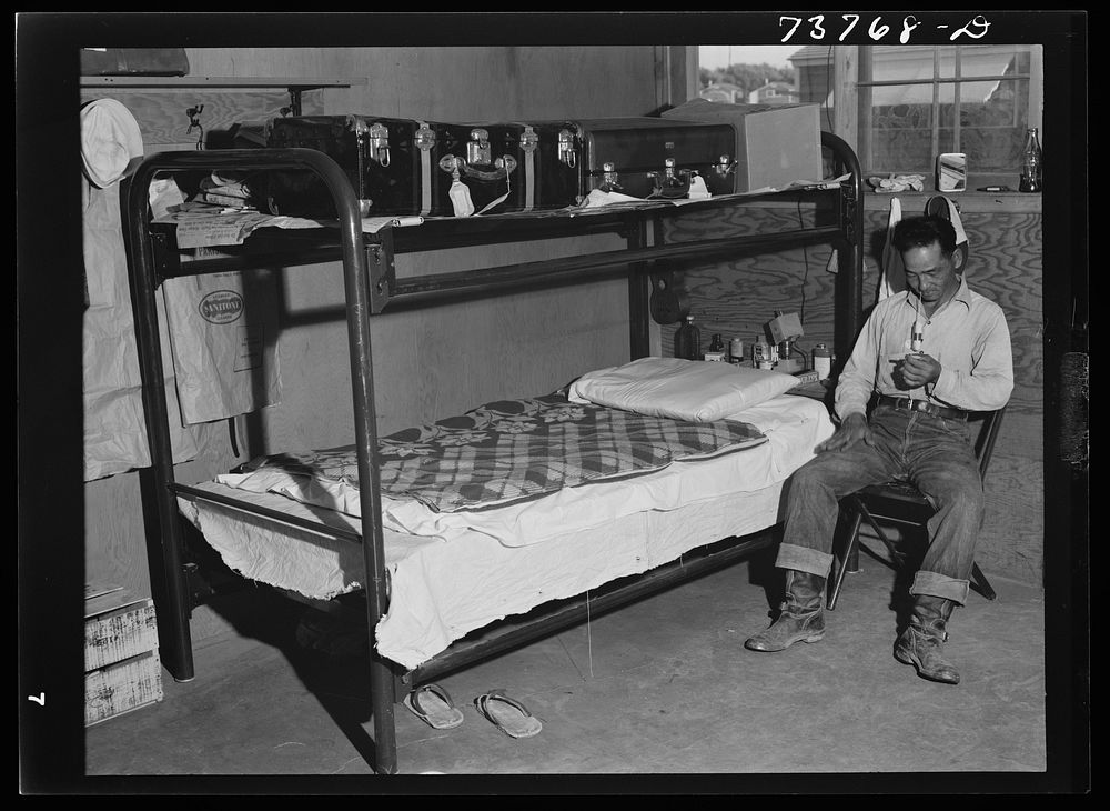 Twin Falls, Idaho. FSA (Farm Security Administration) farm workers' camp. Interior of row shelter in which Japanese…