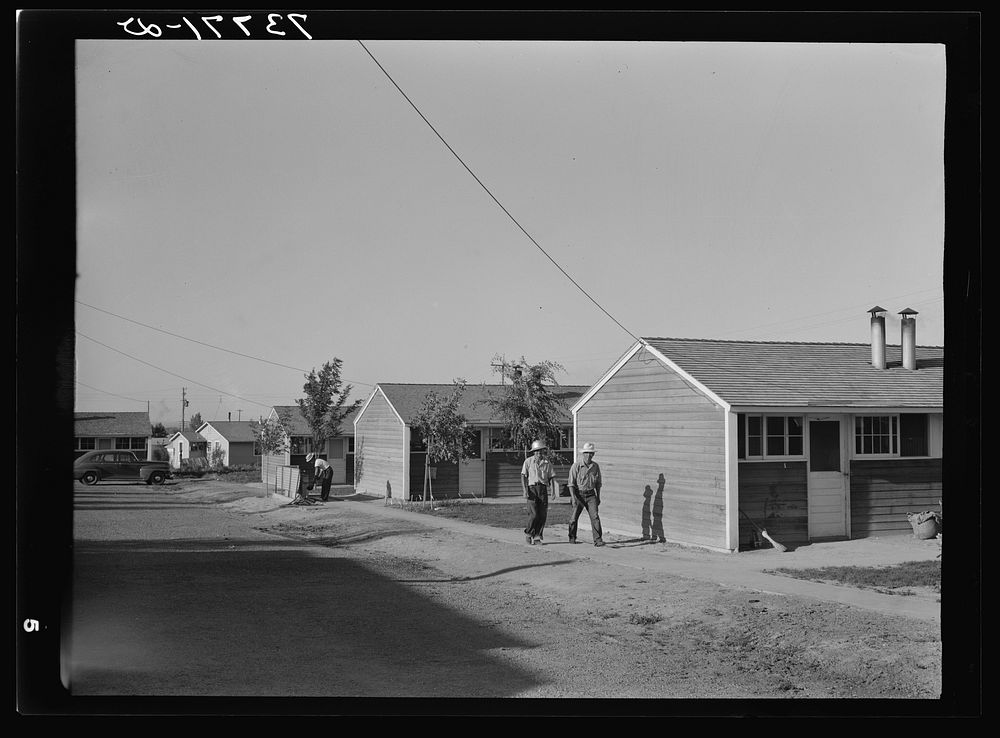 Twin Falls, Idaho. FSA (Farm Security Administration) farm workers' camp. Row shelters in which the Japanese live by Russell…