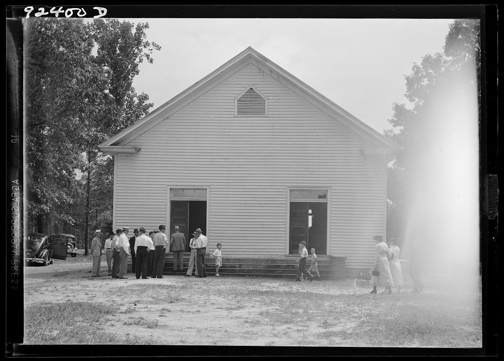 [Untitled photo, possibly related to: Congregation entering church. Wheeley's Church. Person County, North Carolina] by…