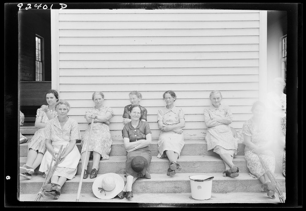 [Untitled photo, possibly related to: Women assembled at Wheeley's Church near Gordonton, North Carolina, to clean up church…