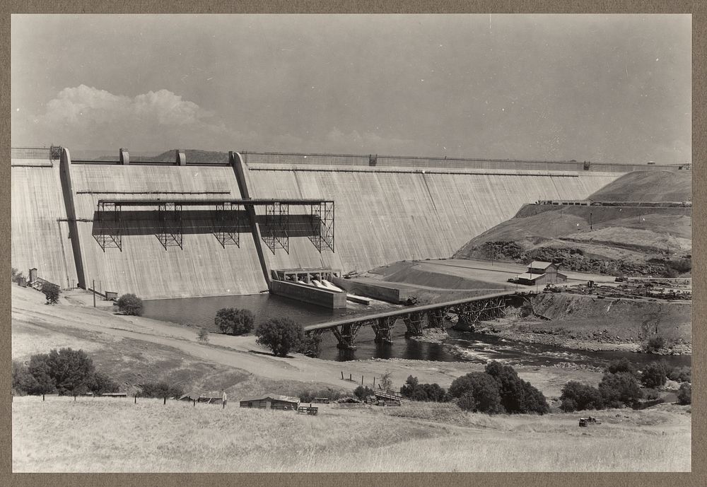 Friant Dam, Central Valley Reclamation Project, Calif. Panoramic view of downstream face of dam showing structure complete…
