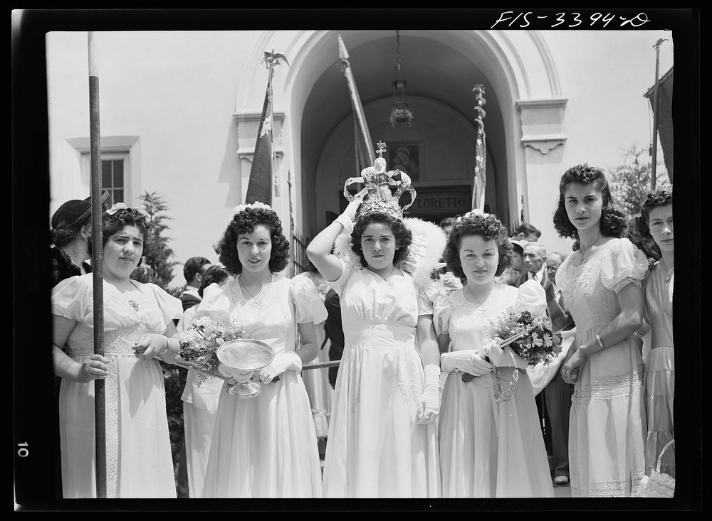 The Queen of the Portuguese-American Festival of the Holy Ghost leaving the church, Novato, California by Russell Lee
