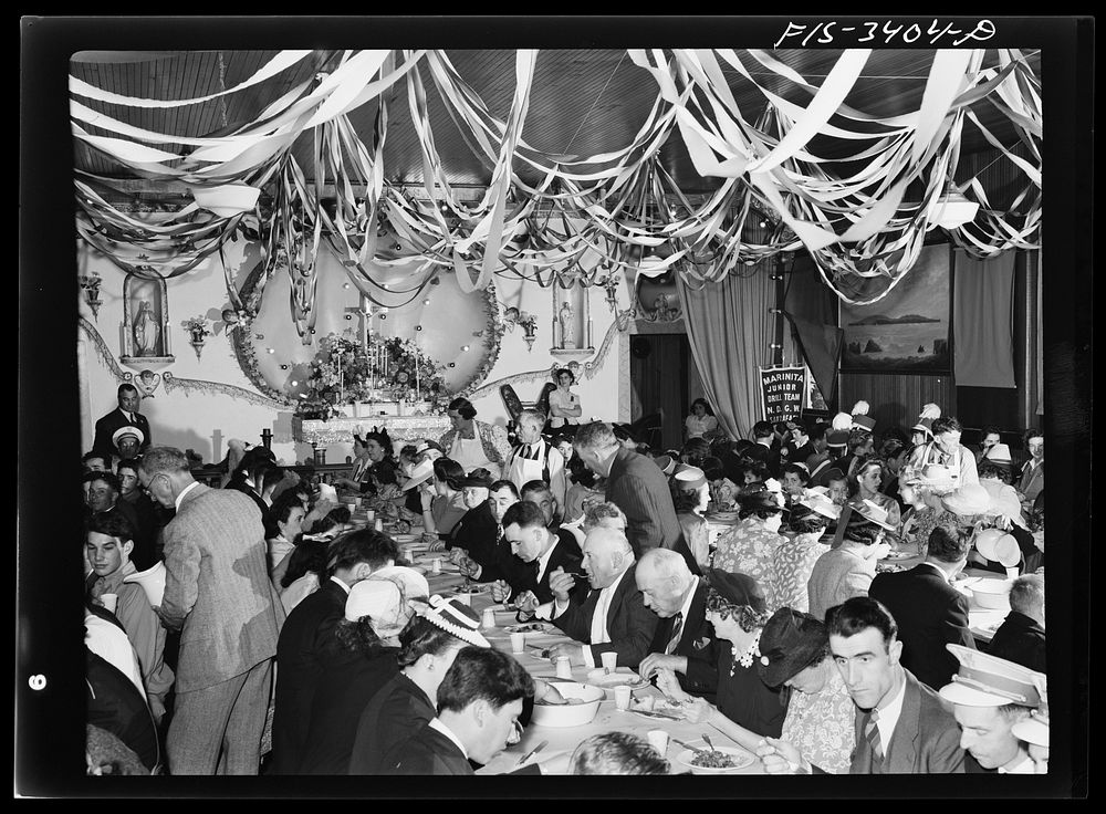 Portuguese-Americans eating dinner in the I.D.E.S.I. hall at the Festival of the Holy Ghost at Novato, California by Russell…