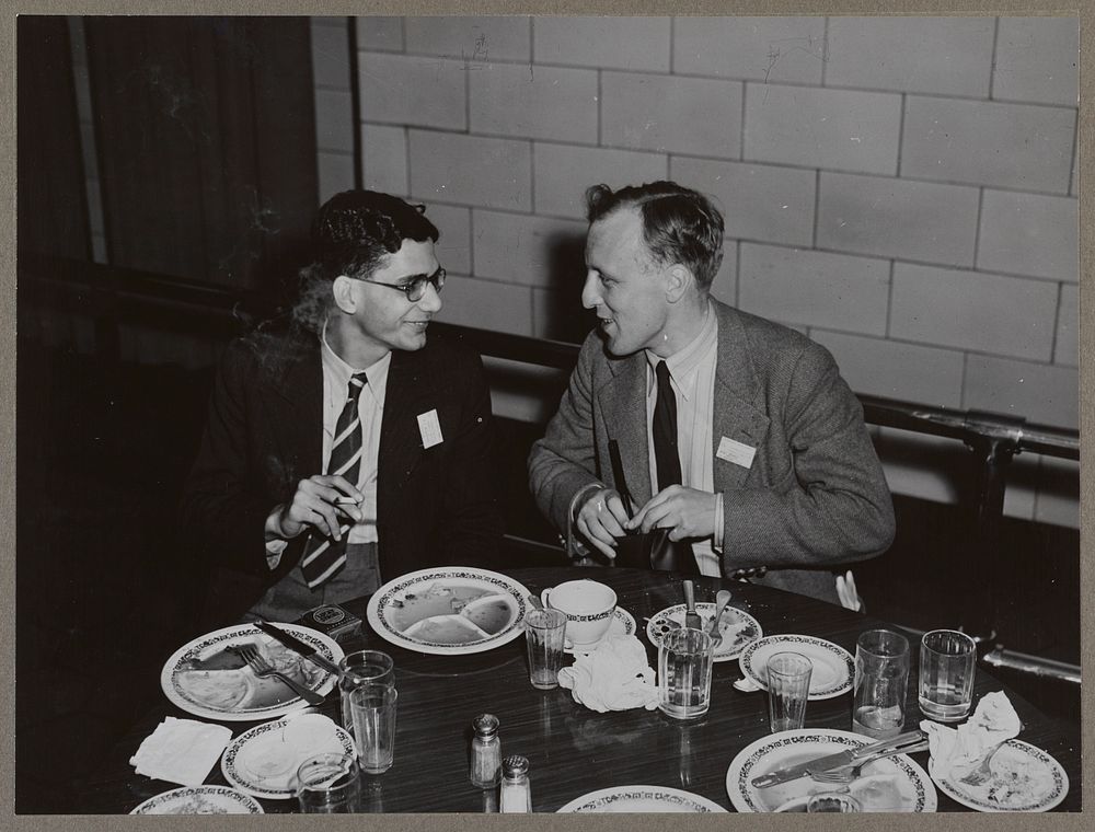 Washington, D.C. International youth assembly. A delegate from India, left, and one from Great Britain, having lunch in the…