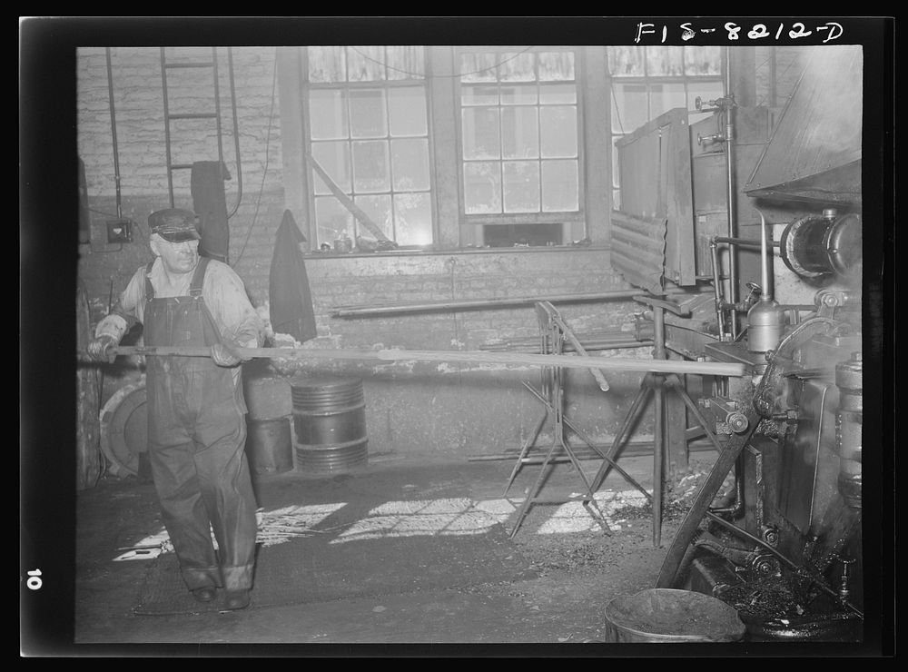 Butte, Montana. Anaconda Copper Mining Company. First step in making bits for a pneumatic drilling machine is to heat a rod…