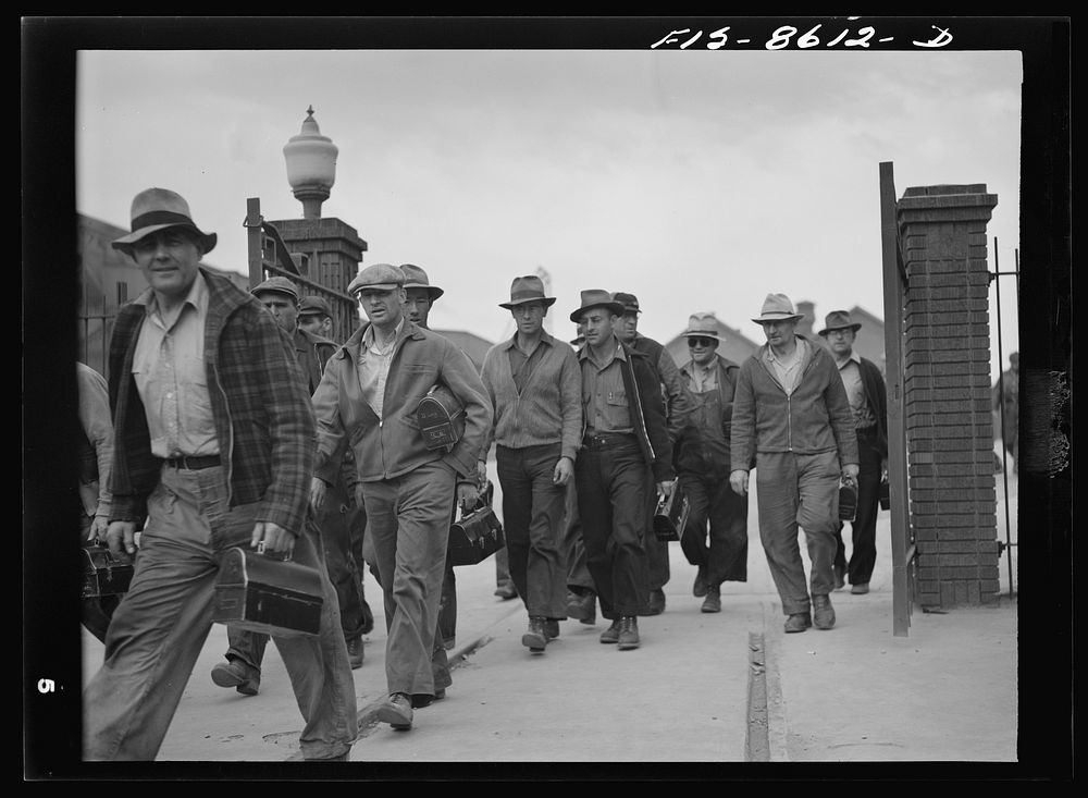 Anaconda smelter, Montana. Anaconda Copper Mining Company. Workmen leaving at end of day by Russell Lee