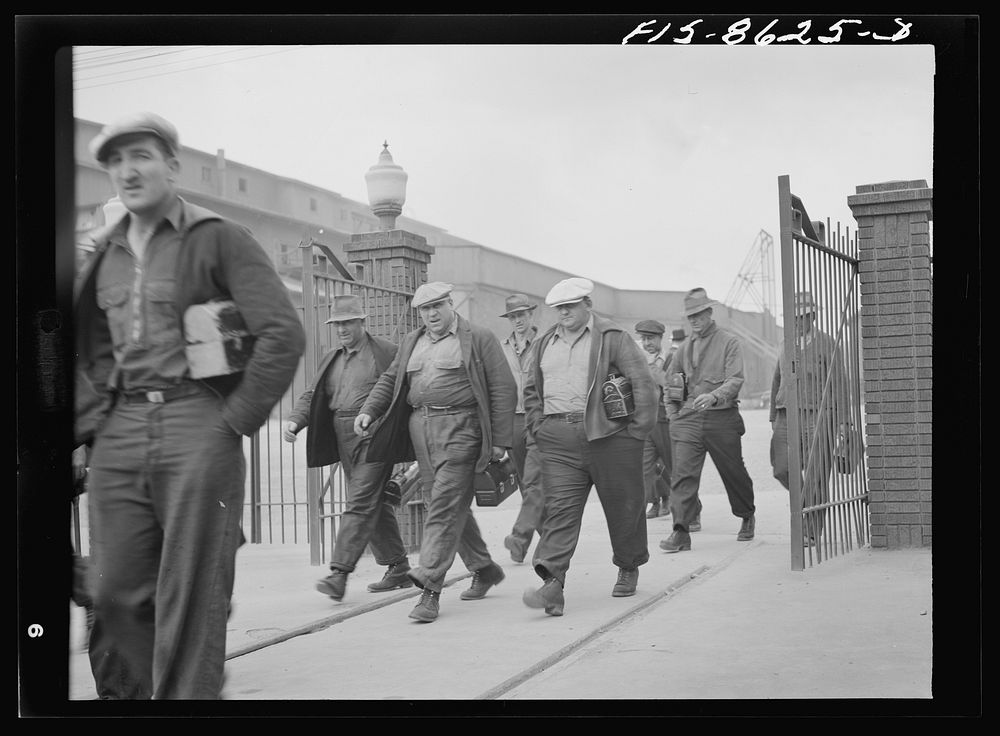 Anaconda smelter, Montana. Anaconda Copper Mining Company. Workmen leaving at end of workday by Russell Lee