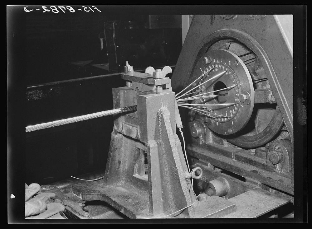 Great Falls, Montana. Anaconda Wire and Cable Company. Stranding hollow conductor cable; the several wires in the frame…