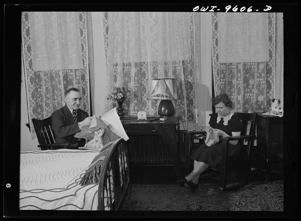 Butte, Montana. John Herlihy, shift boss at the Mountain Con Mine, at home with his wife by Russell Lee
