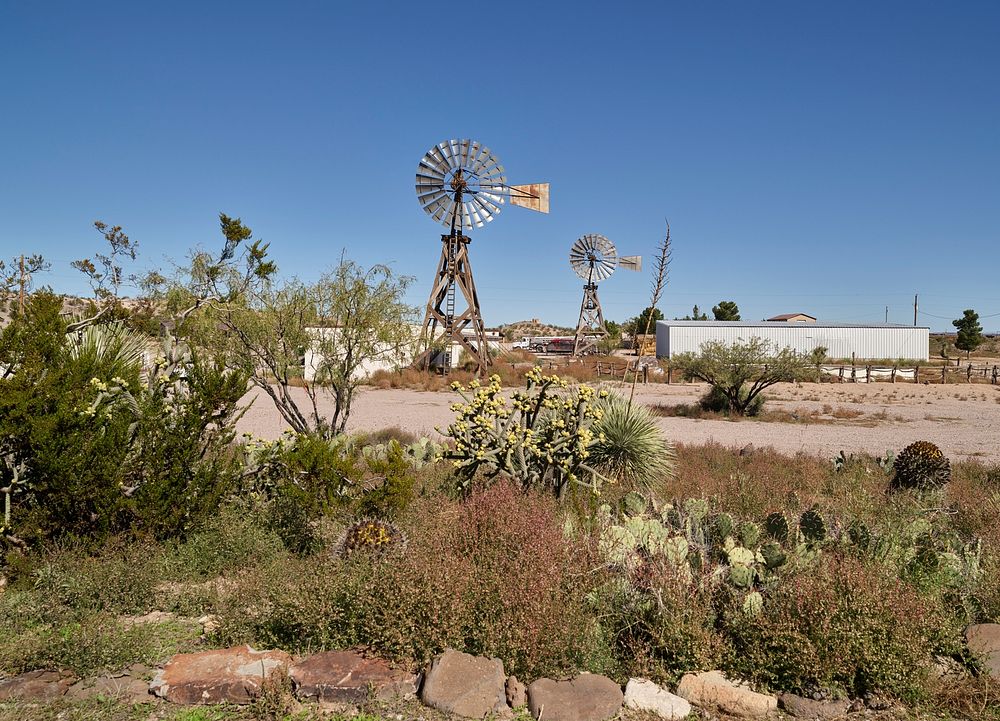 Double 1915-vintage windmills at the historic Lazy B Ranch on the New Mexico border &mdash; in fact, entered from New Mexico…