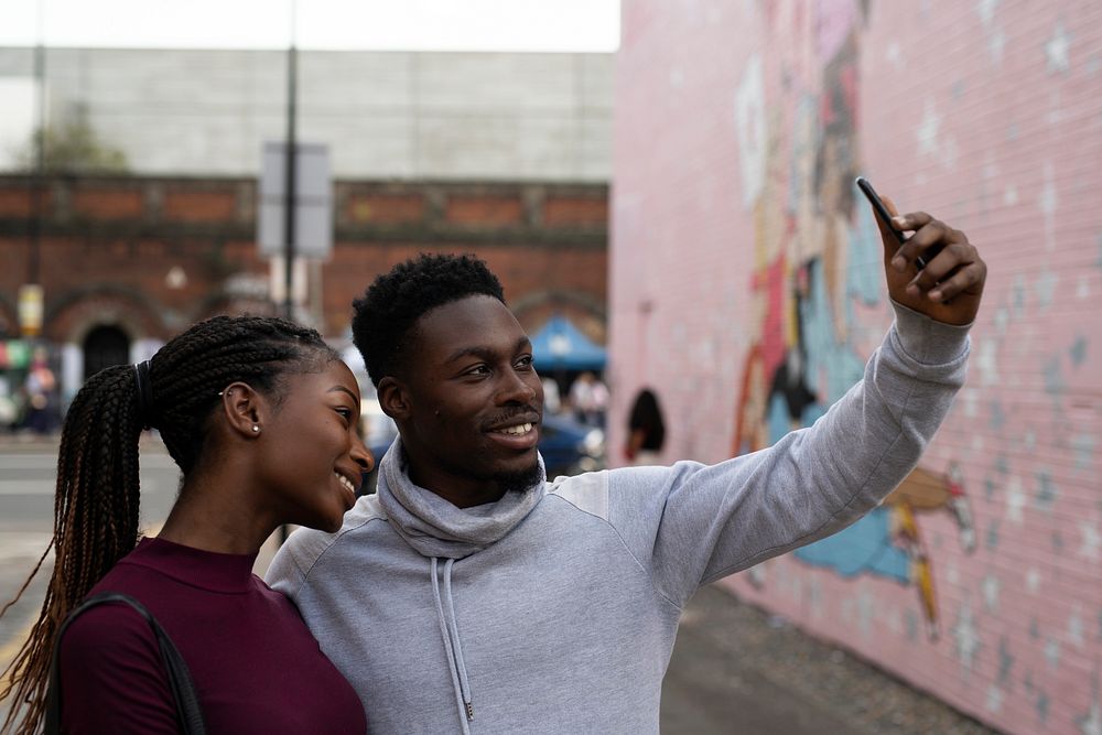 Couple taking a selfie in London