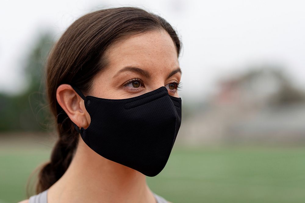 Female athlete wearing mask in the new normal 