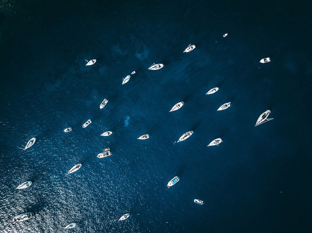 Free boat in ocean aerial view image, public domain ship CC0 photo.